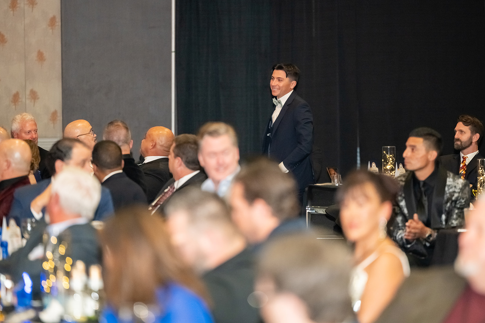 Ceegan being recognized at Pool Nation Conference 2024 in a room full of pool industry leaders